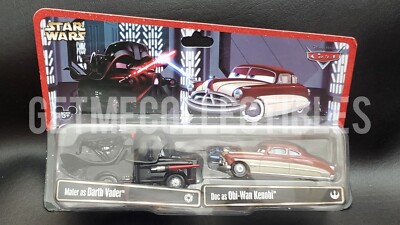 DISNEY CARS STAR WARS MATER AS DARTH VADER DOC AS OBI-WAN KENOBI