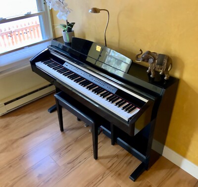 Digital piano Yamaha Clavinova CLP-230 in Ebony finish with stool