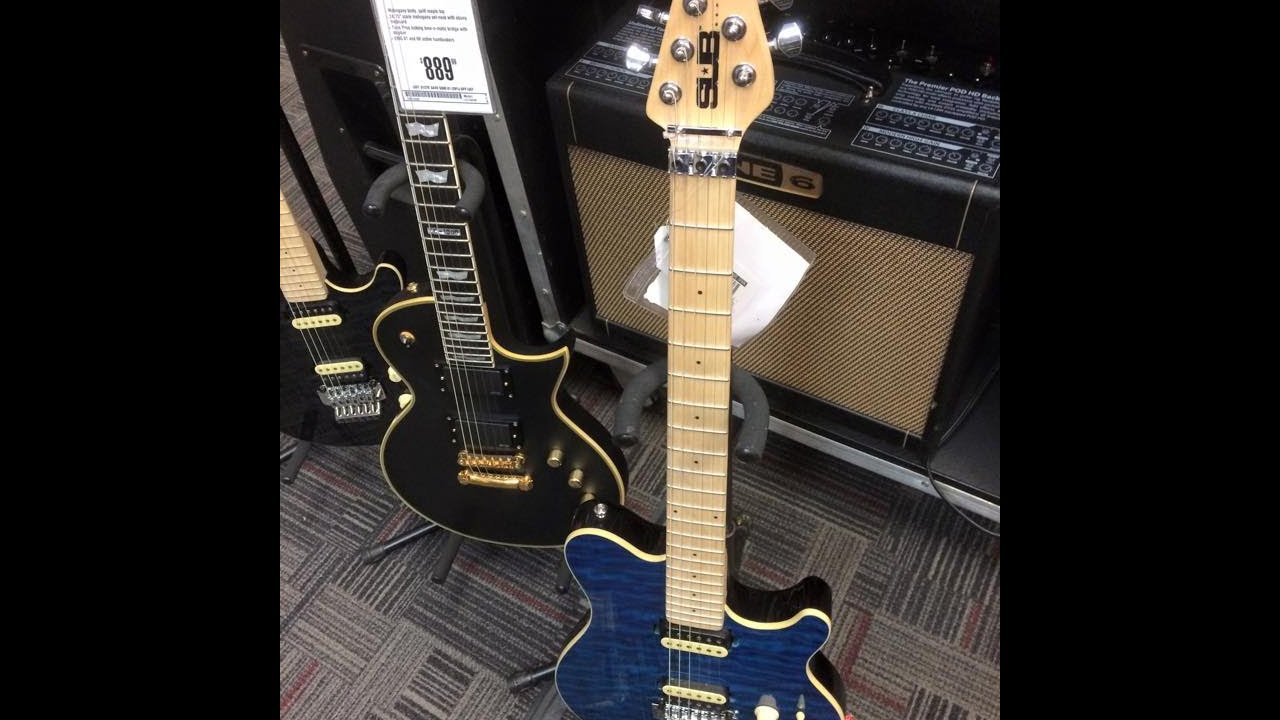 Playing the Ernie Ball Sterling by Music Man AX4 Sub Series - YouTube