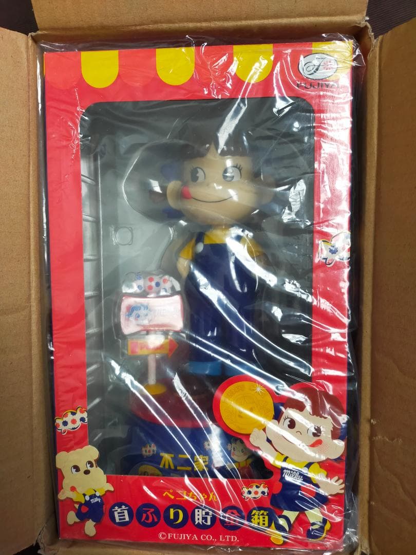 不二家　ペコちゃん首振り貯金箱 Amazon.co.jp: 不二家 ペコちゃん 首振り 人形 貯金箱 ポコちゃん