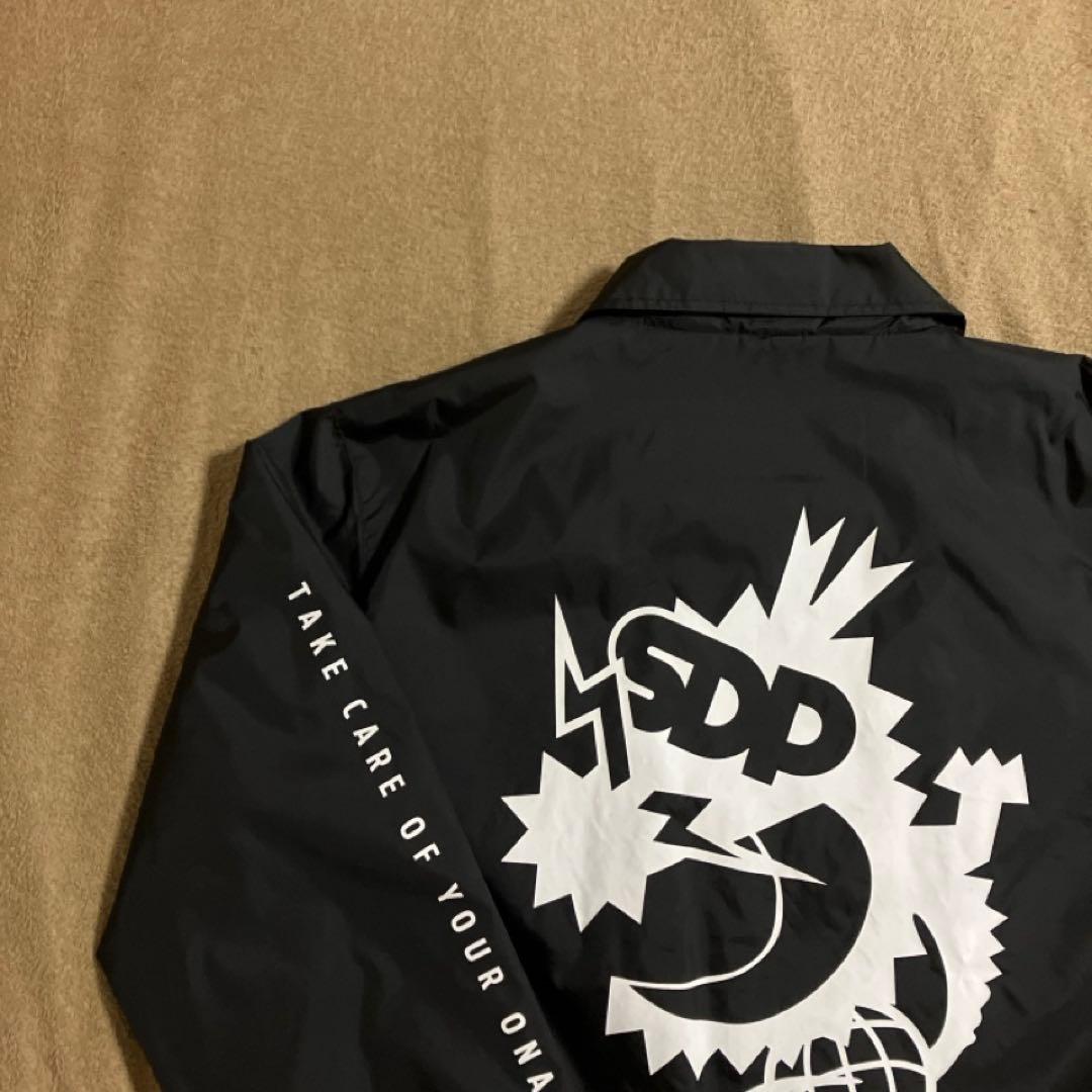 コロコロコミック×スチャダラパー コーチジャケット　Lサイズ　黒 コロコロコミック×スチャダラパー コーチジャケット Lサイズ 黒 - メルカリ
