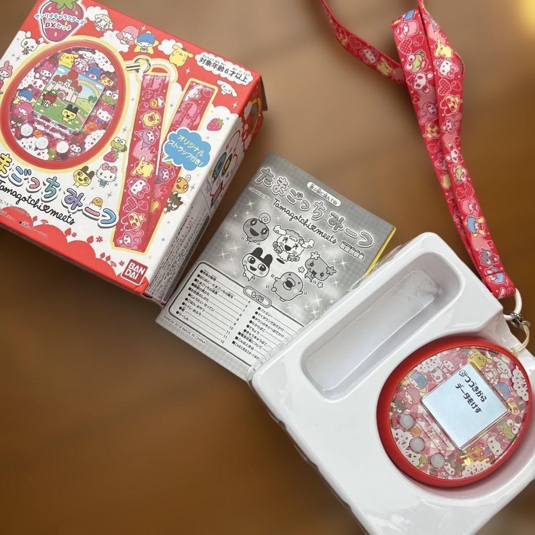 たまごっちミーツ サンリオ箱、説明書付き Amazon.co.jp: Tamagotchi meets (たまごっちみーつ) サンリオ